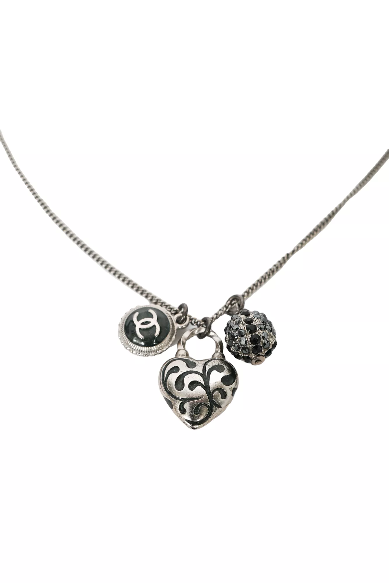 Chanel 2009 Silver Tone Heart Shaped CC Charmed Necklace