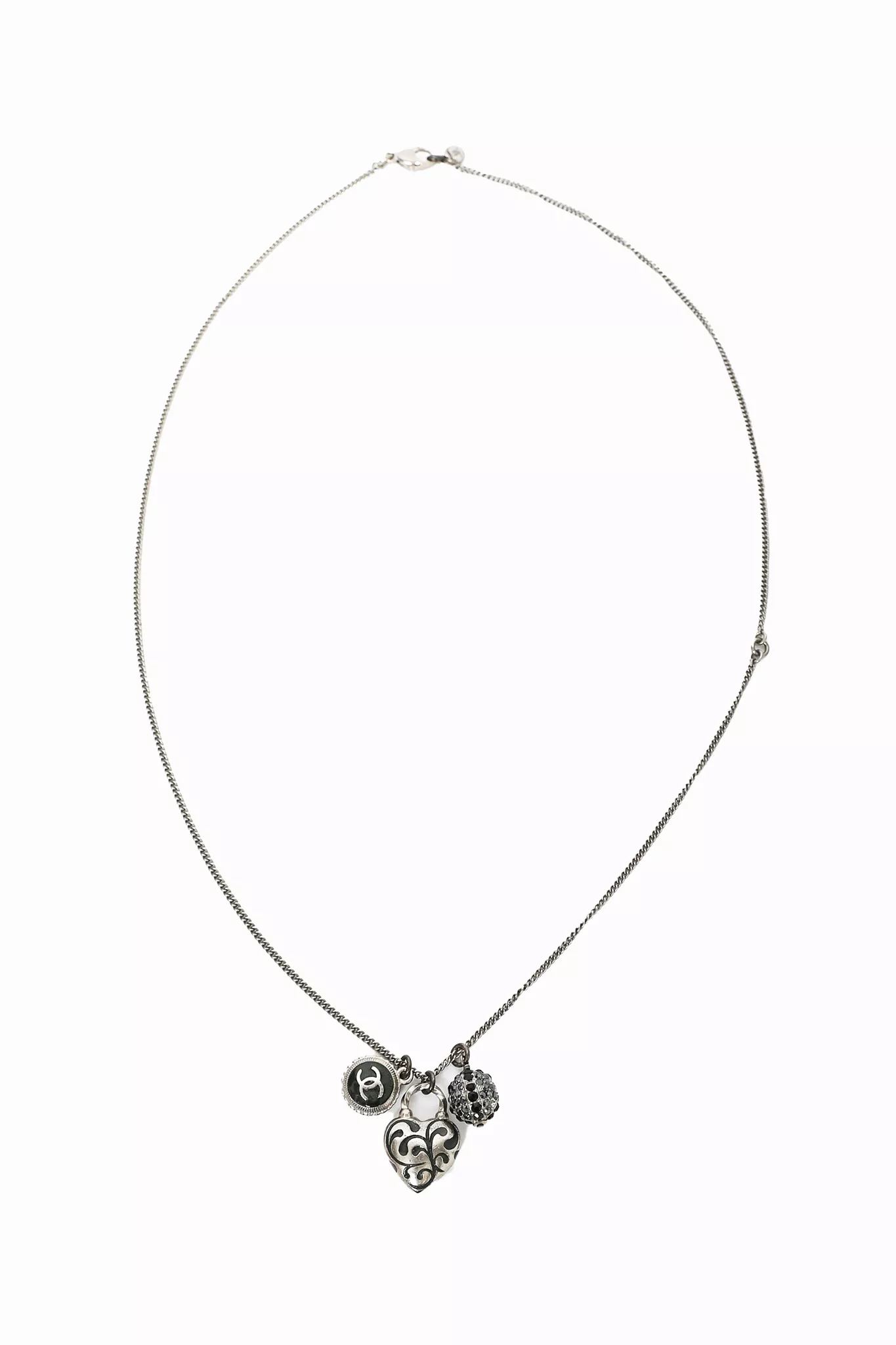 Chanel 2009 Silver Tone Heart Shaped CC Charmed Necklace