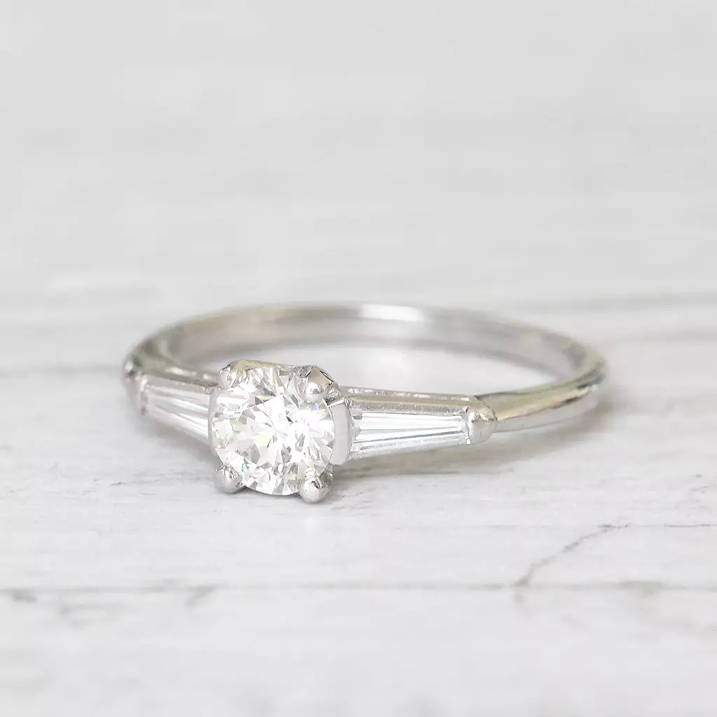 Vintage 0.65 Carat Brilliant Cut and Tapered Baguette Cut Diamond Solitaire