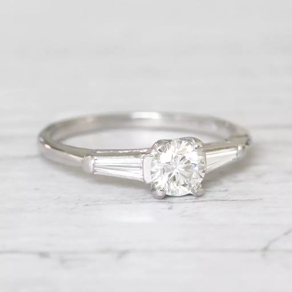 Vintage 0.65 Carat Brilliant Cut and Tapered Baguette Cut Diamond Solitaire