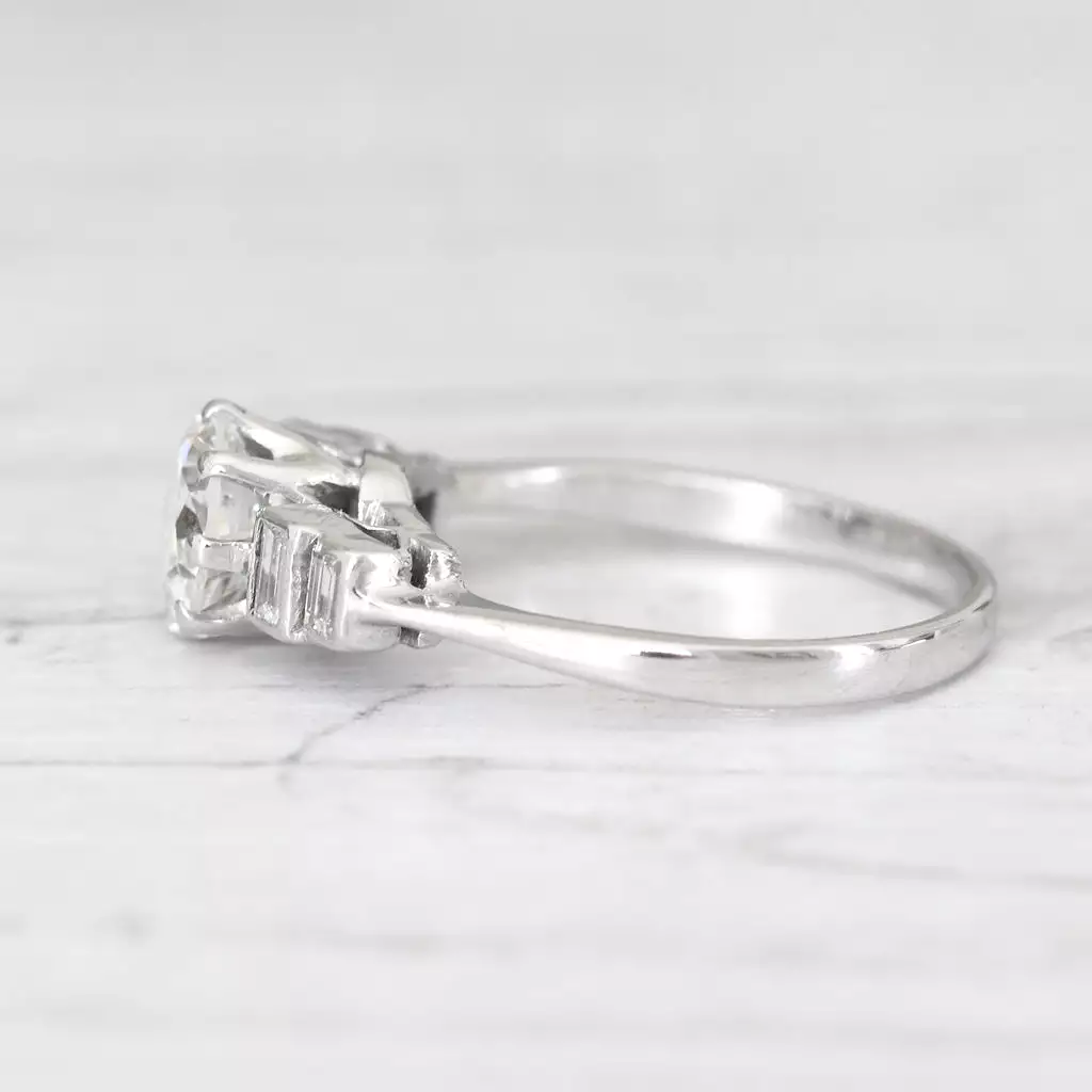 Vintage 1.23 Carat Brilliant Cut Diamond Solitaire with Baguette Diamond Shoulders