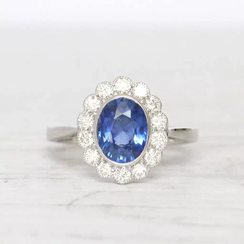 Vintage Style 2.29 Carat Sapphire and Diamond Oval Cluster