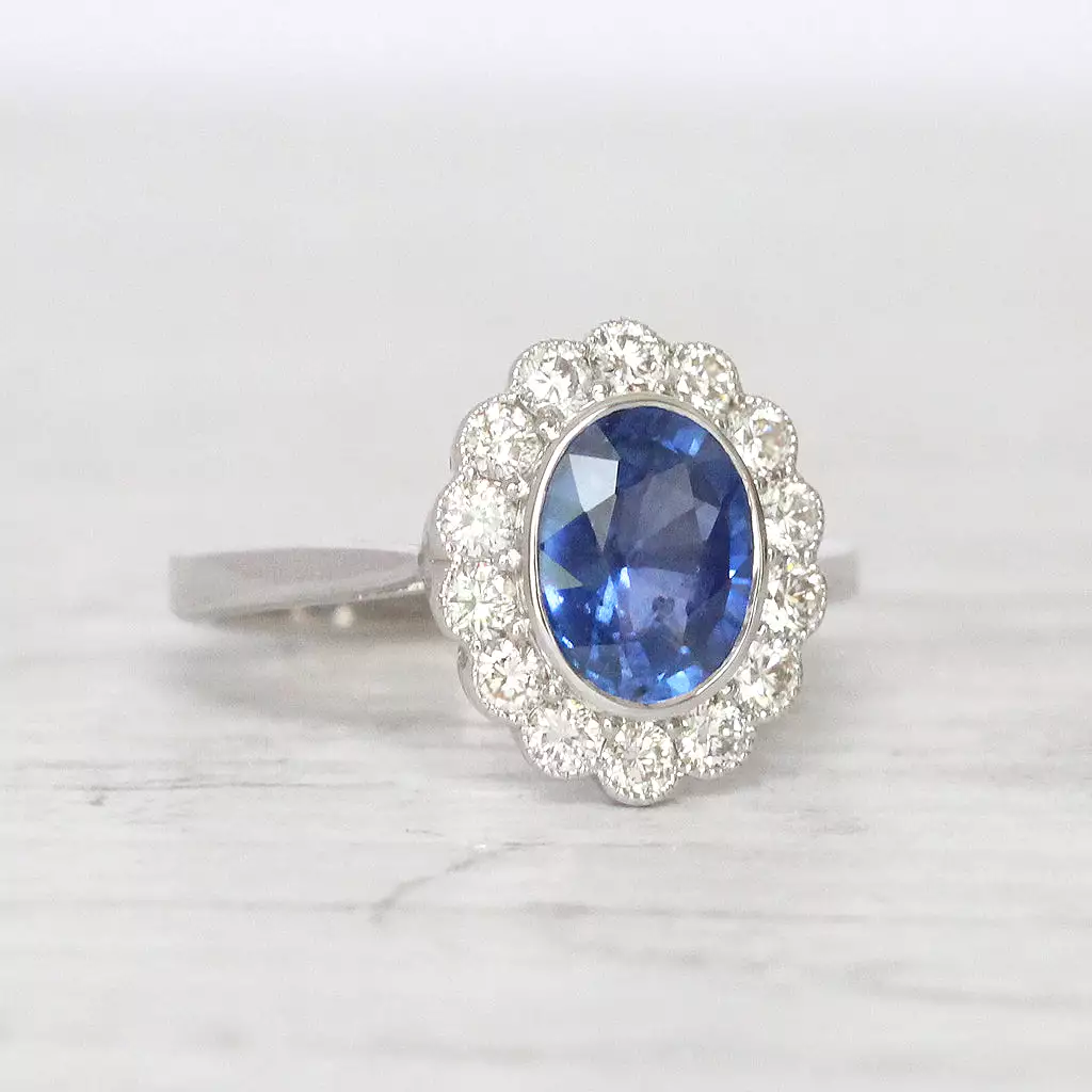 Vintage Style 2.29 Carat Sapphire and Diamond Oval Cluster